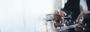 Homme d'affaires utilisant une tablette numérique et une technologie de réseau client - délocalisation d'entreprise - Activ Solution